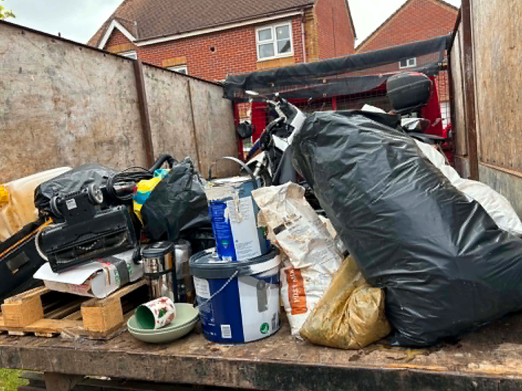 House clearance load with appliances and household items